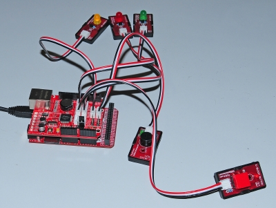 Picture of a FEZ Panda II board with 3 LEDs,a button and a buzzer